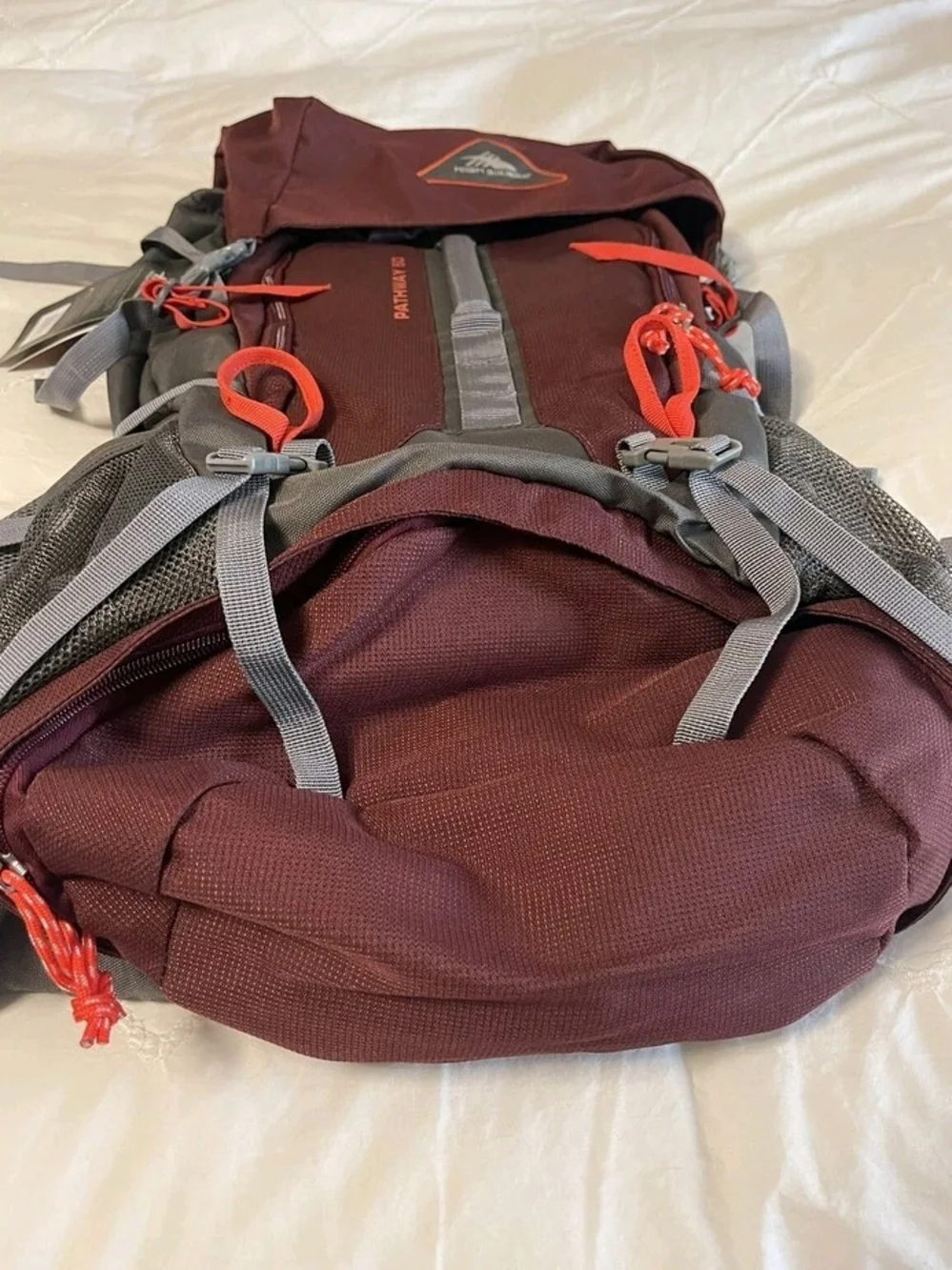 Men's Burgundy Hiking Backpack with Gray Straps and Red Accents